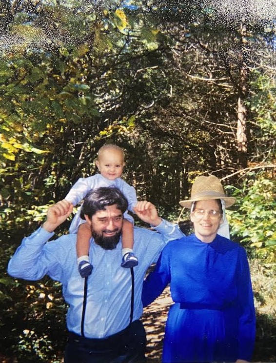 Eythana Miller as a young child with her grandfather.